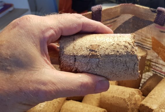 Recycled sawdust fuel briquettes